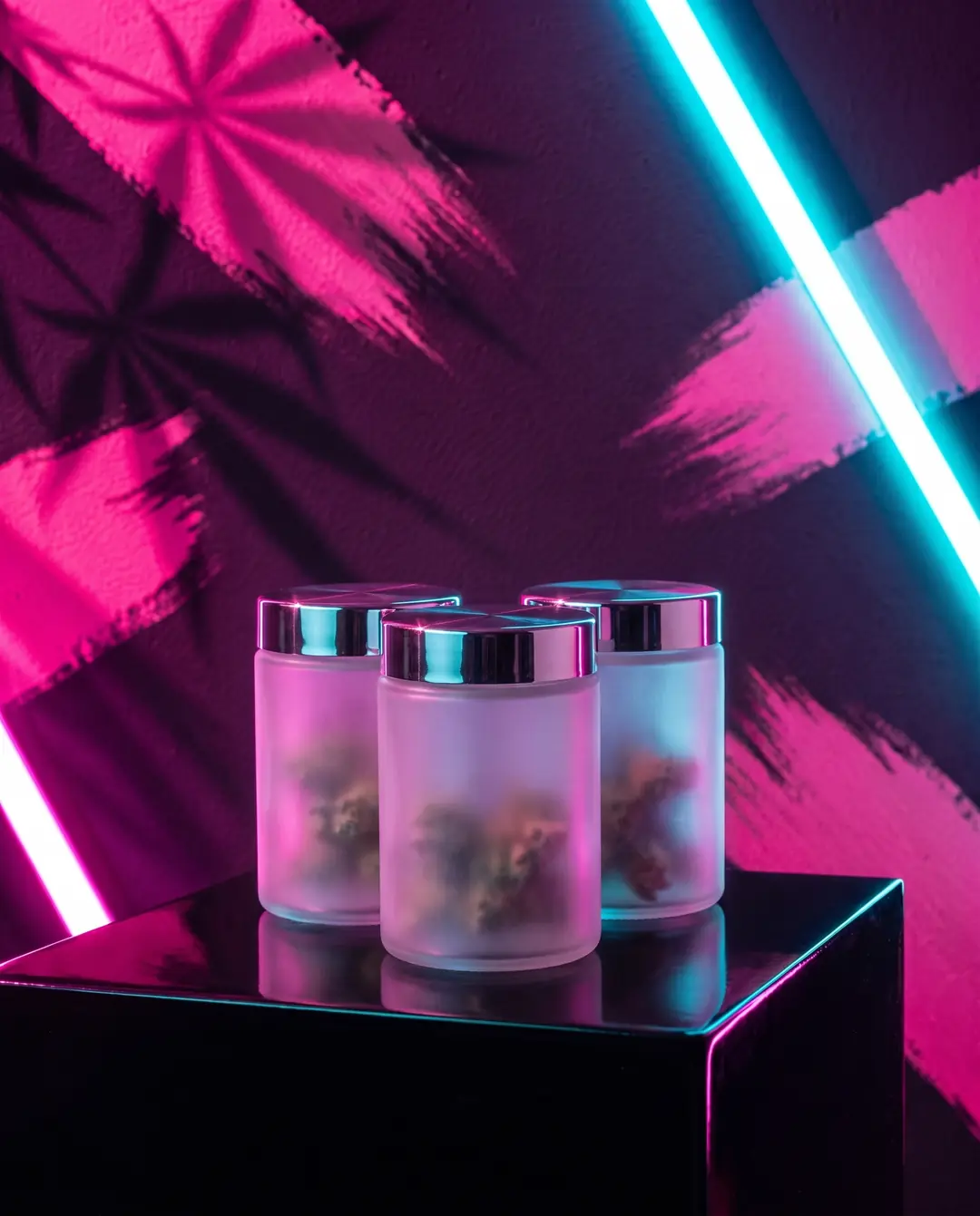 Three unlabeled frosted glass jars with chrome lids on a black lacquer plinth, hot-pink brush strokes, cannabis-leaf shadows and a diagonal cyan neon tube on a plum wall behind